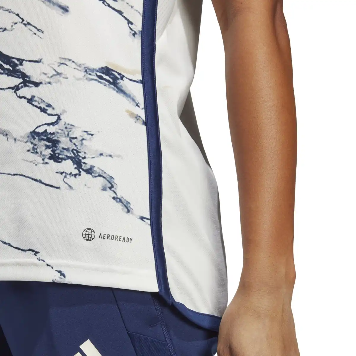 HT1615_11_APPAREL_On_Model_Detail_View_3_white.webp